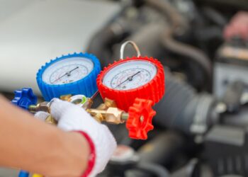 how much gas does a car use idling with ac