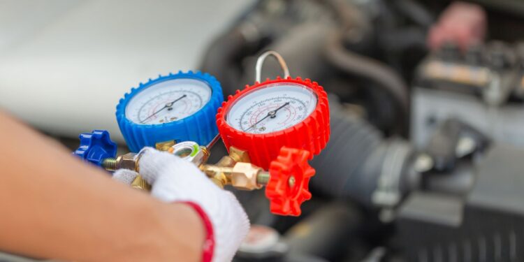 how much gas does a car use idling with ac