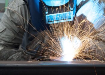 what does the "e" in "e-7018" designate?